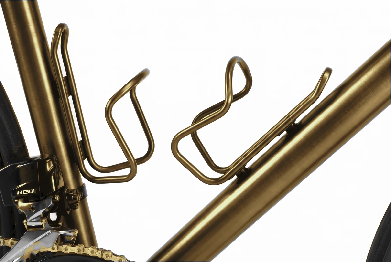 Titanium frame with two anodized bottle cages, whose finish sweeps through the full color spectrum as the page scrolls.