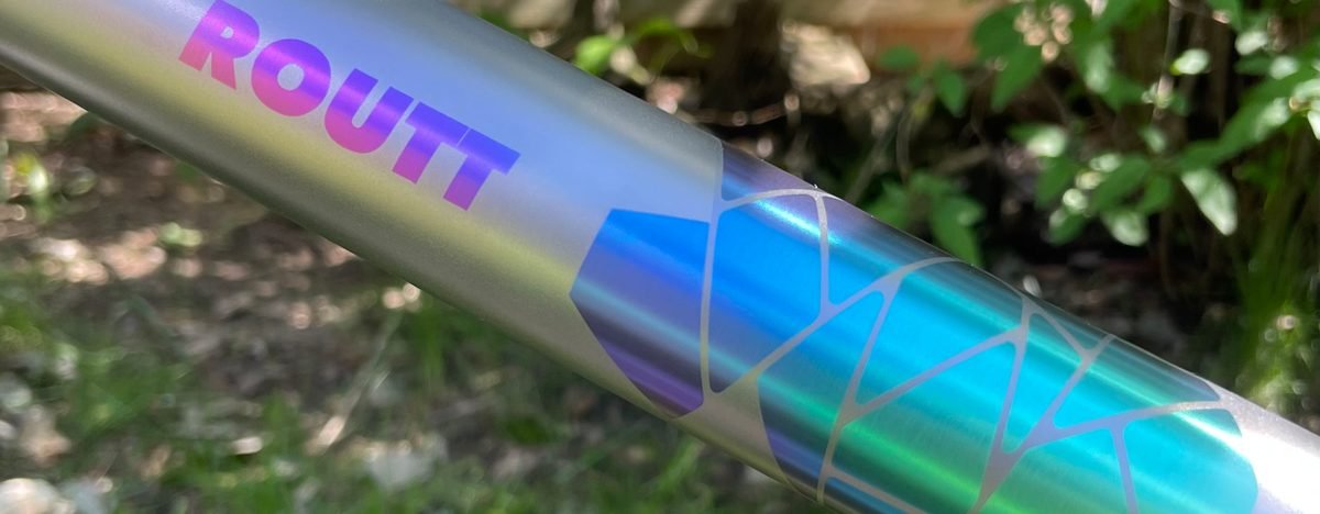 Moots ROUTT top tube with a faceted blue-to-teal anodized fade